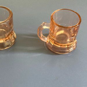Two super cute pink glass 1 oz glasses with handles
